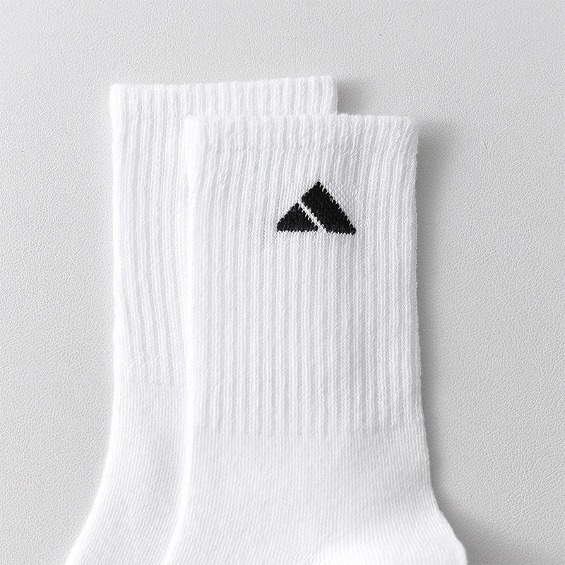 5 pairs of black and white patterned mid length socks suitable for both men and women comfortable and unisex sports socks